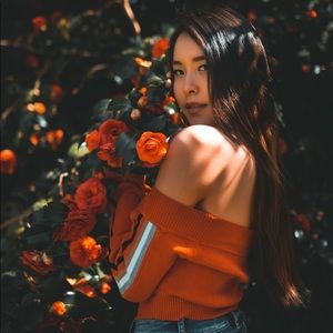 Beautiful orange off the shoulder crop top